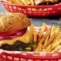 Cheeseburger Basket · Cheeseburger with French fries and toppings.