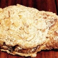 Almond Croissant - Tue & Fri · Available only on Tuesday and Friday.  

House made croissant brushed with almond syrup, fil...