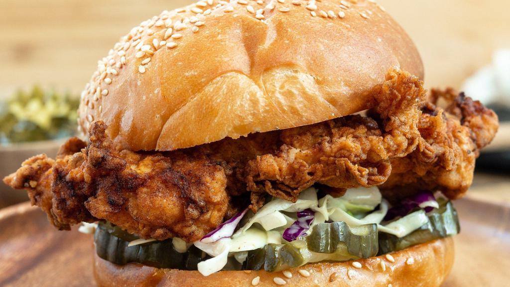 Frick'N Chick'N Sandwich · Our signature Southern fried chicken sandwich served with creamy coleslaw and housemade bread and butter pickles on a grand central bun.