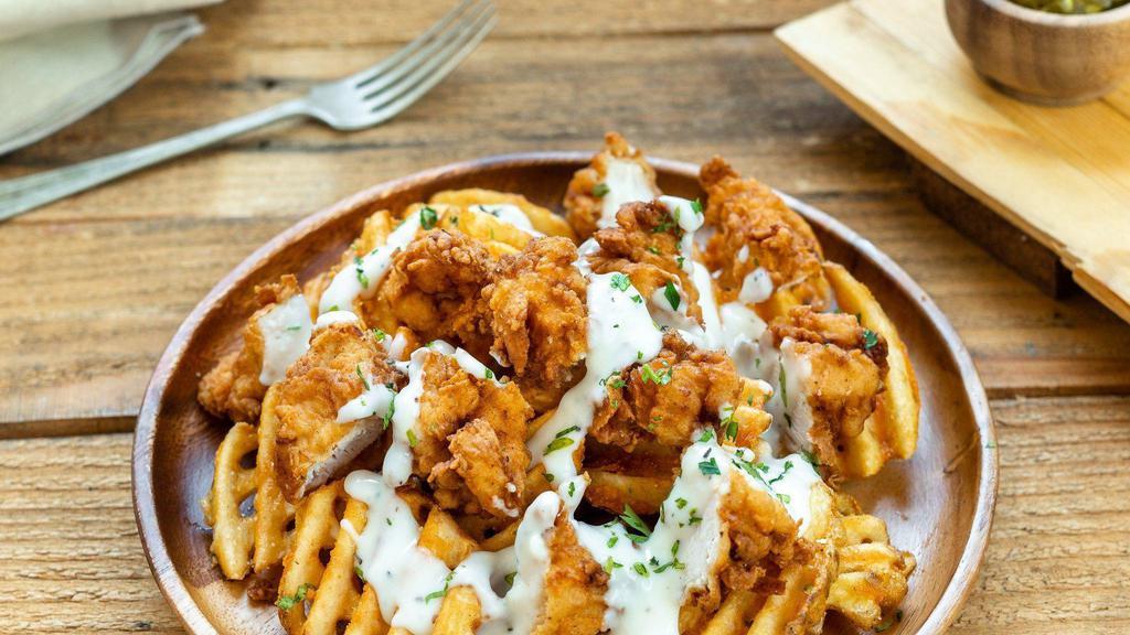 Chicken ＆ Waffle Fries · Waffle fries topped with pieces of crispy chicken and country gravy. (Gravy is served on the side)