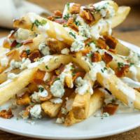 Bacon ＆ Blue Fries · Crispy natural cut fries covered in housemade blue cheese dressing, crispy bacon and more bl...