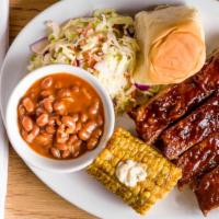 Large Ribs Meal · Four ribs, one roll, coleslaw, baked beans.

(Utensils & napkins provided ONLY UPON REQUEST).
