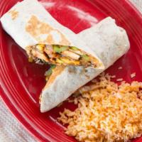 California Burrito · Grilled chicken, roasted corn, black beans, tomato, green and red pepper, Spanish rice, onio...