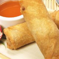 Thai Egg Roll · 2 handmade deep fried thinly sliced egg rolls stuffed with veggies and vermicelli noodles wr...
