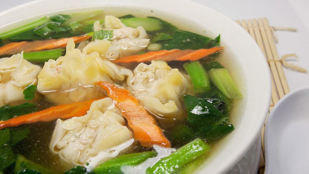 Wonton Soup · A traditional wonton soup with 6 chicken filled wontons, carrots, and bok choy.