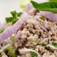 Larb · Cooked with locally sourced, USDA certified, free range, grass fed ground pork marinated in ...