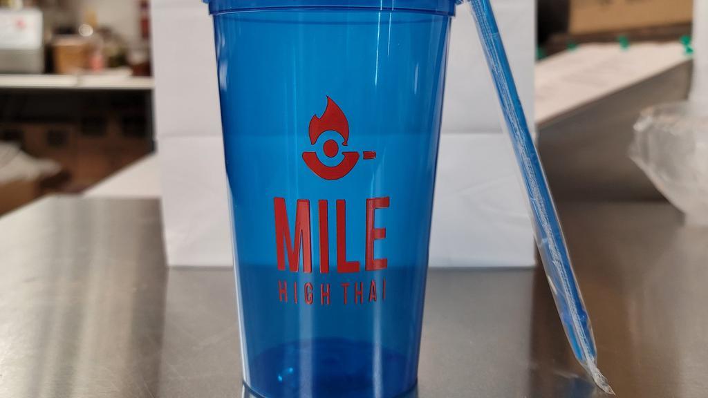 (Blue) Mile High Thai Tea · Get your Thai Tea in a translucent blue color 22 oz cup with an orange Mile High Thai logo. 

Polypropylene plastic material. BPA and lead free. Hand wash only. Made in the USA. CPSIA Certified, CA Prop 65 Compliant, and FDA Approved.