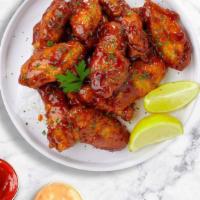 Honey Cookout Wings · Fresh chicken wings breaded, fried until golden brown, and tossed in honey and barbecue sauc...
