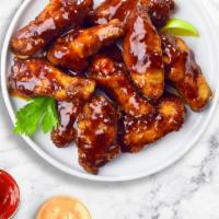 Bonjour Bbq Wings · Fresh chicken wings breaded, fried until golden brown, and tossed in barbecue sauce. Served ...