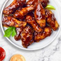 Spice Coaster Bbq Wings · Fresh chicken wings breaded, fried until golden brown, and tossed in spicy barbecue sauce. S...