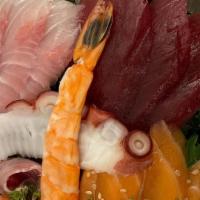 Chirashi Bowl · Various raw fish are arranged on a bed of sushi rice.