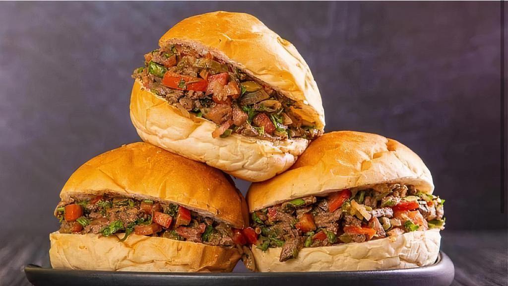 Beef Shawarma (Egyptian Gyro) · Beef with lamb shawarma with tomato  Parsley Onion and Tahini sauce