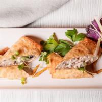 Jalapeño Popper Egg Rolls · Egg rolls filled with cream cheese, jalapeño, black beans, roasted red peppers, green onions...