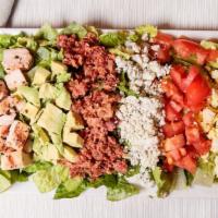 Cobb Salad  · Romaine lettuce, eggs, tomatoes, bleu cheese crumbles, jalapeño bacon bites, and avocado. Ch...