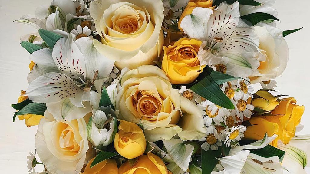 Happy Yellows · Bring some sunshine inside with these lovely yellow flowers; roses, alstroemeria & chamomile flowers.