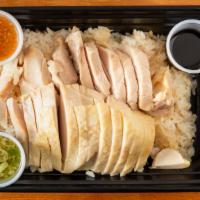 Hainan Chicken Rice · Boneless chicken thigh with chicken flavor rice with three sauces (ginger scallion, lemon th...