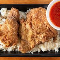 Fried Chicken Leg Quarters Rice · Deep-fried chicken leg quarters with tomato oyster garlic sauce served with white rice.
