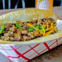 The Green Chili Philly · Steak, grilled onions, green chili, jalapenos, Cheddar cheese.