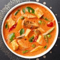 Red Curry  · Hot exotic red curry paste with coconut milk, basil, broccoli, cabbage, bell peppers, carrot...