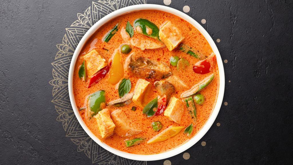Red Curry  · Hot exotic red curry paste with coconut milk, basil, broccoli, cabbage, bell peppers, carrots, and bamboo shoots. Served with steamed jasmine rice.