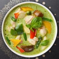 Green Curry  · Medium spicy green chili paste with coconut milk, basil, bell peppers, carrots, broccoli, ca...