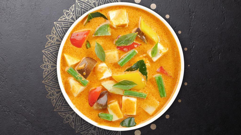 Massaman Curry  · Potatos, onions, carrots, tomatoes, and peanuts in massaman curry sauce. Served with steamed jasmine rice.