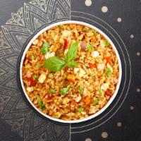 Spicy Fried Rice · Jasmine rice, egg, basil, onions, bell peppers, onions, and chili garlic sauce. Spicy