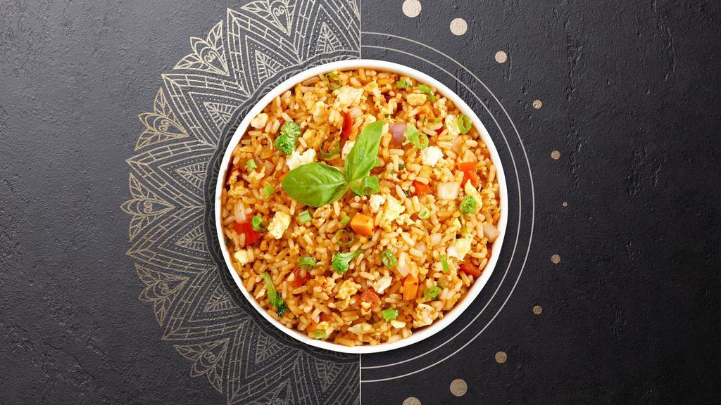 Spicy Fried Rice · Jasmine rice, egg, basil, onions, bell peppers, onions, and chili garlic sauce. Spicy