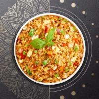 Japanese Fried Rice · Jasmine rice, egg, peas, carrots and onions.