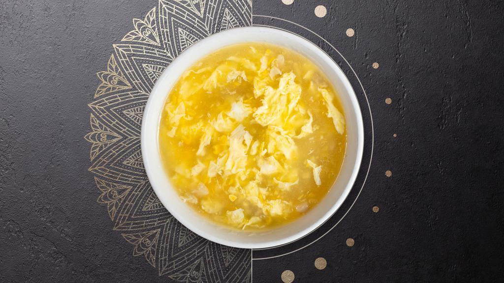 Egg Drop Soup · Classic velvety broth with beaten eggs.