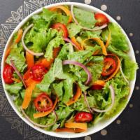 Green Salad  · Romaine lettuce, cucumbers, cherry tomatoes, carrots, fresh bell peppers, and onions dressed...