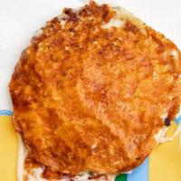 La Panchita · Stuffed with loroco and cheese, topped with cream and mozzarella cheese. 
Gratinado con crem...