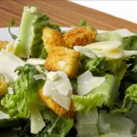 Caesar Salad · Fresh chopped romaine lettuce with shredded parmesan cheese croutons, served with caesar dre...
