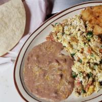 #9 Huevos  A La Mexicana / Mexican Style Eggs · 2 huevos revueltos con Pico de Gallo, papas y frijoles. / 2 scrambled eggs with Pico de Gall...