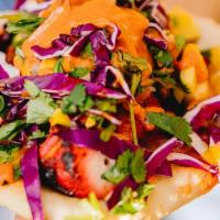 Shilp Craft Tacos · Hand rolled naan, Mango de gallo, red onions, cilantro topped with secret sauce.