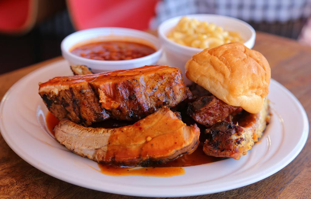 Baby Back Ribs Plate · Half Rack of Baby Back Ribs with 2 Side Dishes.