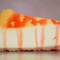 New York Cheesecake. · CLASSIC ITALIAN DESSERT
W/ OPTIONAL
STRAWBERRY DRIZZLE