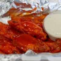 Wings · YOUR CHOICE OF MILD, BUFFALO HOT, BBQ, OR SWEET MANGO HABANERO SERVED W/ YOUR CHOICE OF RANC...
