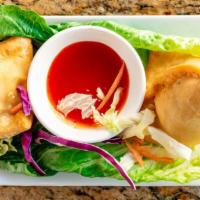 Veg Samosa · Potato and peas / meat  stuffed in phyllo pastry dough and stuffed, deep fried serve with ch...