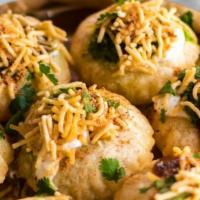 Pani Puri · Treat of Mumbai, Crispy parcels filled with spiced potato & peas  served with aromatic pani,...