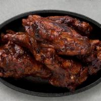 Jerk Wings · Served with celery or carrots.