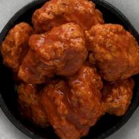 Buffalo Hot Boneless Wings · Served with celery or carrots.