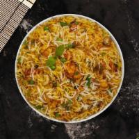 Super Biryani · With basmati rice, onions, and herbs.