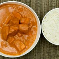 Butter Chicken  · Boneless chicken breast cooked in butter, tomato and cream gravy.