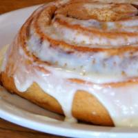 Fresh Baked Cinnamon Rolls · Our Hugh cinnamon rolls are made from scratch and baked  fresh daily. A mountain of sweet, g...