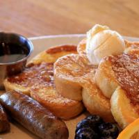 French Toast Stack · Three pieces of Vienna bread, cooked golden brown and dusted with powdered sugar. Served wit...