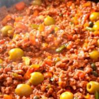 Picadillo A La Habanera · Ground beef seasoned and cooked in a lite tomato sauce with green olives.