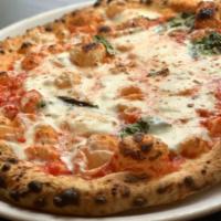 12In Margherita · Fresh Mozzarella, San Marzano Tomato Sauce, Basil, EVOO. * We do not recommend adding more t...