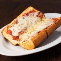 Pizza Bread · French bread covered in pizza sauce and mozzarella cheese with a choice of toppings.