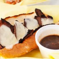 French Dip Au Jus Sandwich · Roast beef soaked in our delicious au jus with melted provolone.
